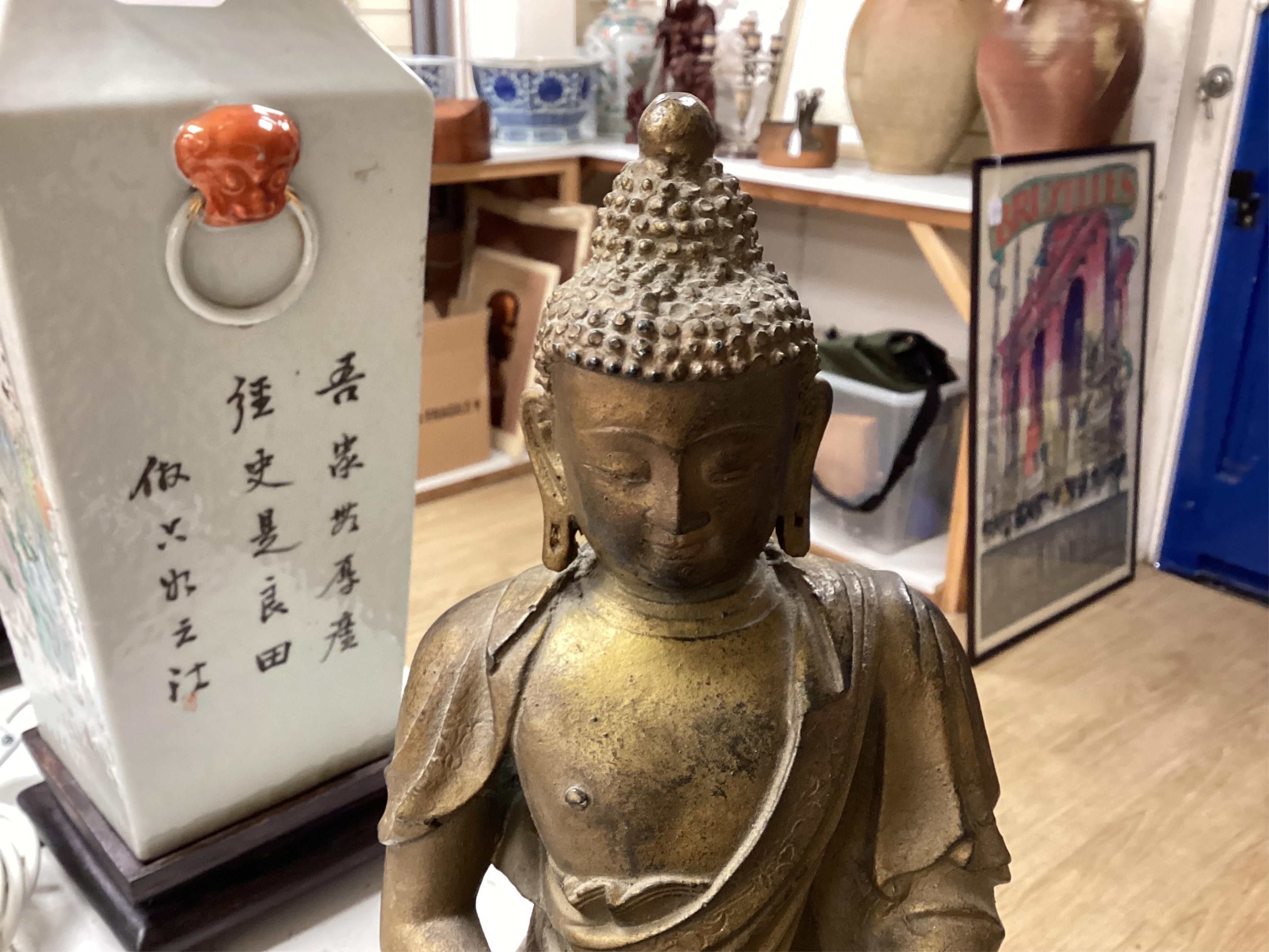 A pair of early 20th century Chinese famille rose vases, mounted as lamps and a plaster model of a Buddha, vases 46cm
